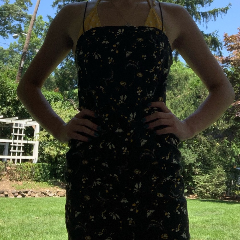 Black mini spaghetti strap dress.